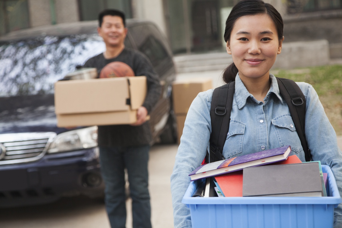 Portrait picture of Father taking daughter to college