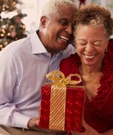 Couple with present to be opened